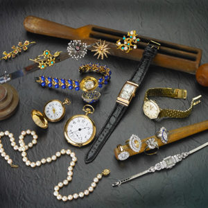 Pre-owned luxury watches and fine jewelry items used for collateral on loans
